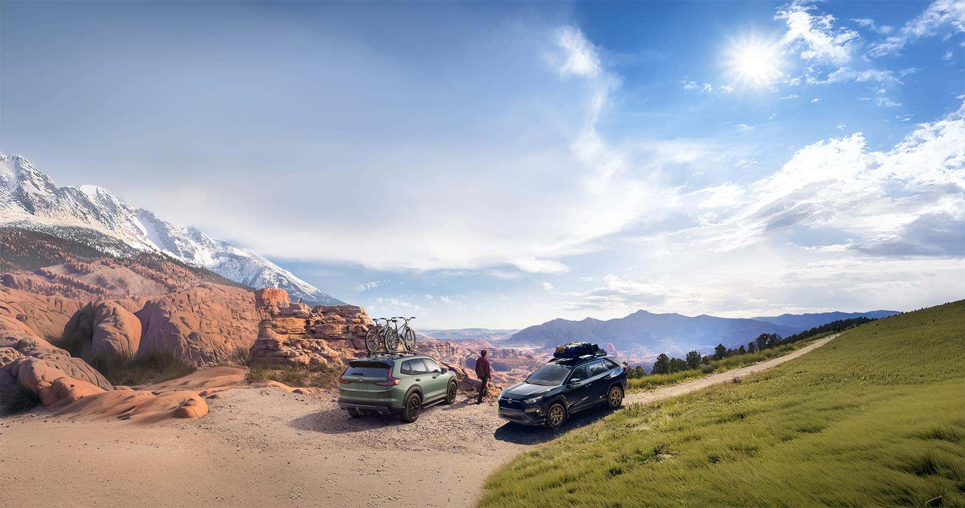 CR-V Hybrid vs RAV4 Hybrid off road models parked in the mountain deserts of colorado