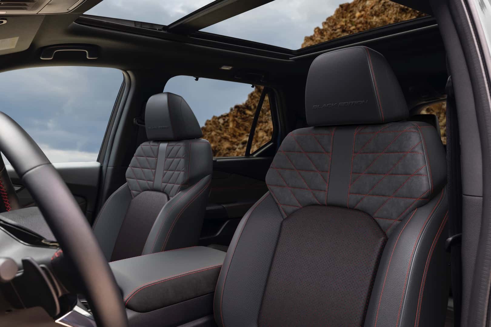 Interior view of the 2026 Honda Pilot Black Edition front seats