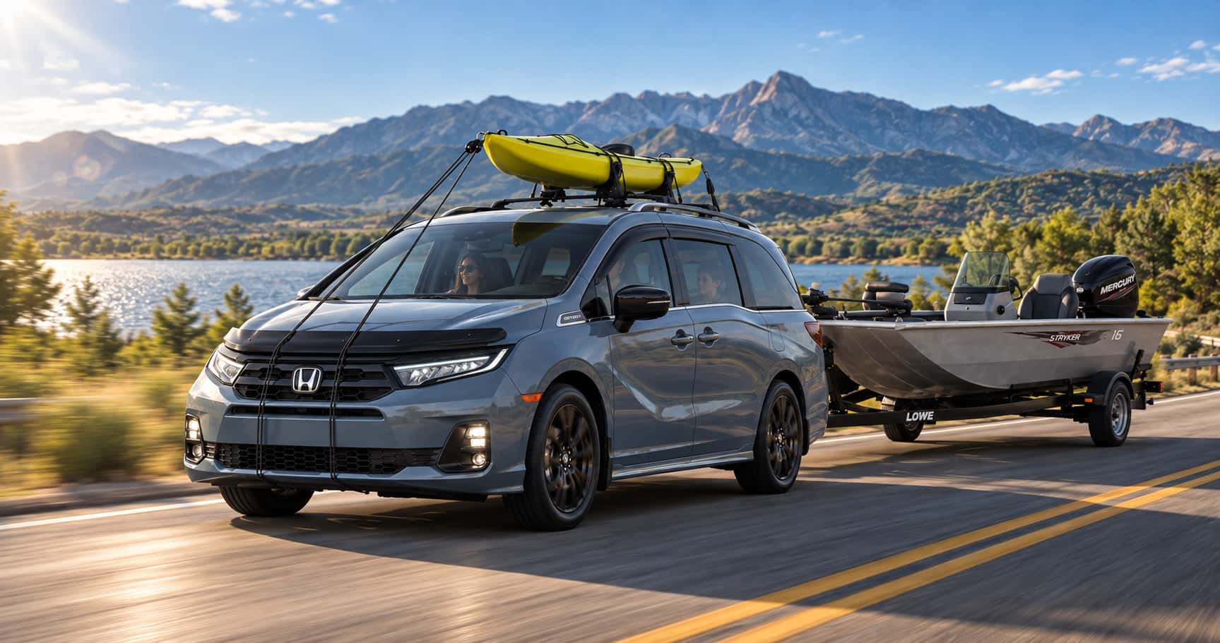 2027 Honda Odyssey Sport-L towing a boat near Boulder, CO