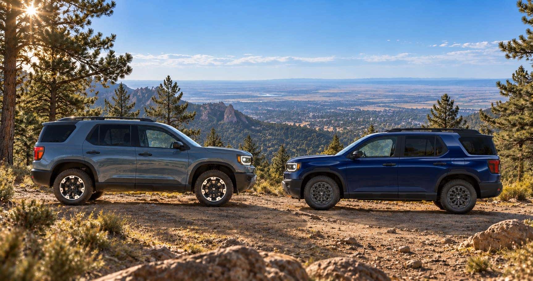 2027 Honda Passport TrailSport and 2026 Honda Passport TrailSport on a mountain trail near Boulder, CO