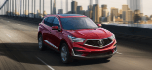 2021 Acura RDX driving on bridge