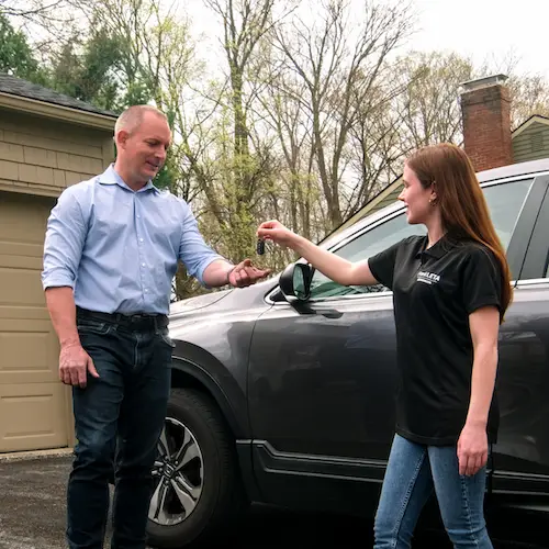 daughter giving dad keys