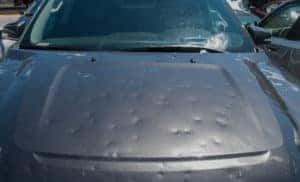 Dented,Car,After,A,Big,Hail,Storm
