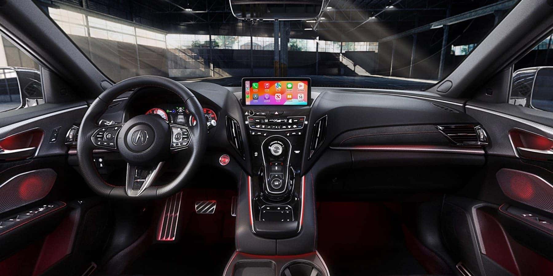 A-Spec interior of the 2026 Acura RDX with red contrast stitching and sport seats