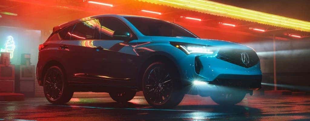 2026 Acura RDX A-Spec at night, front three-quarter view