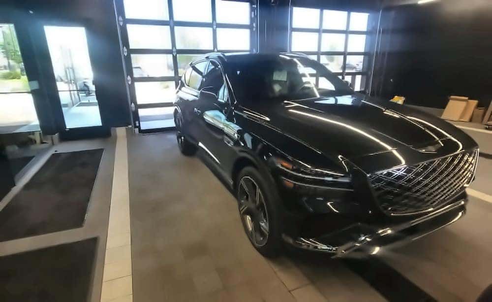 A black Genesis GV80 in the service drive at Genesis of North Cincinnati in Cincinnati, Ohio.