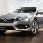 Silver 2018 Honda Civic touring front from low angle