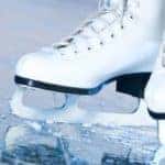 White ice skates on skating rink