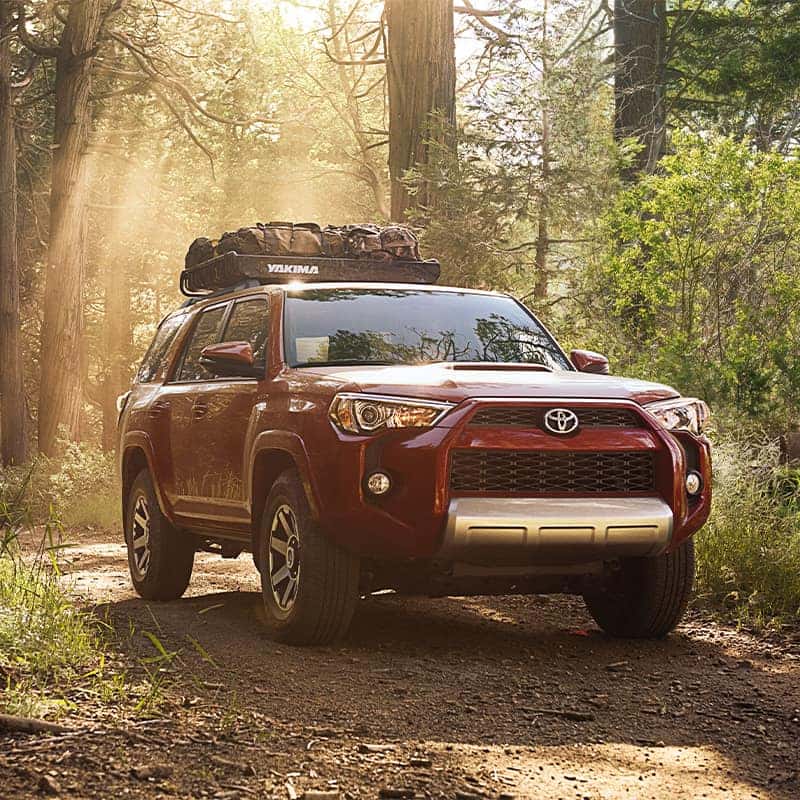 Lancaster Toyota is a Car Dealership in Lancaster near Cornwall PA | Red 2020 4Runner Off-Roading