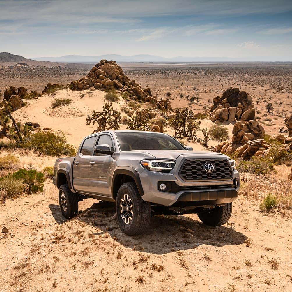 Lancaster Toyota is a Car Dealership in Lancaster near Willow Street PA | 2020 Toyota Tacoma parked on a rock in the dirt