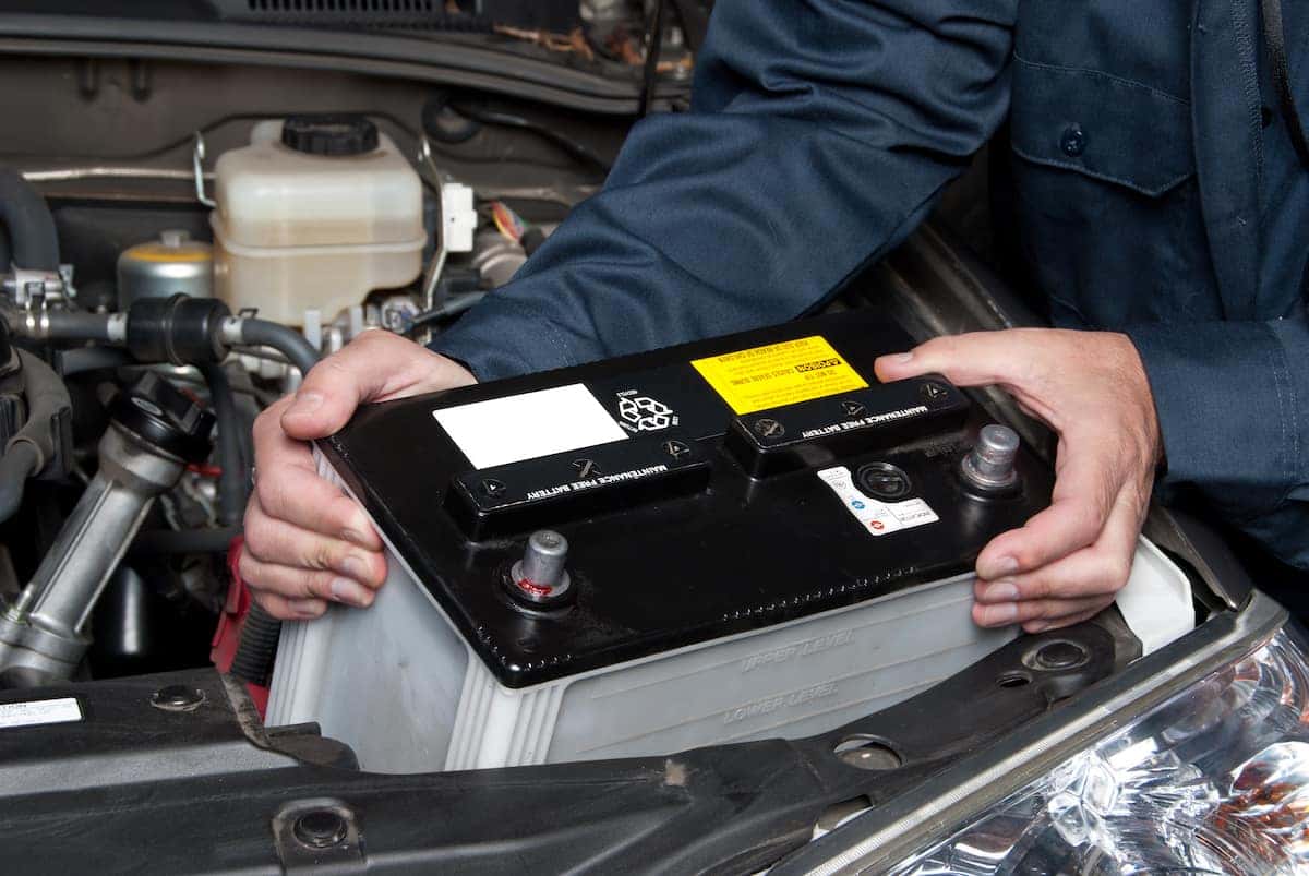 Lancaster Toyota is a Car Dealership in Lancaster near Willow Street PA | Mechanic replacing battery in Toyota vehicle