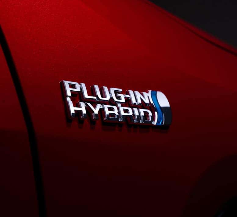 Model Features of the All-New 2022 Toyota RAV4 Prime at Lancaster Toyota | Red 2022 Toyota RAV4 Prime Plug-In Hybrid Badge