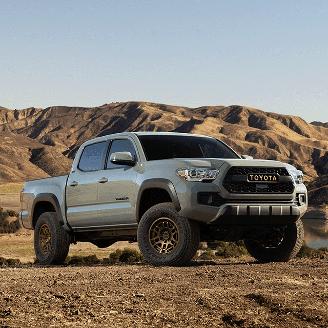 Everything You Need to Know about Your Car Battery at Lancaster Toyota | 2022 Toyota Tacoma Parked on Rocky Terrain in Front of Mountains