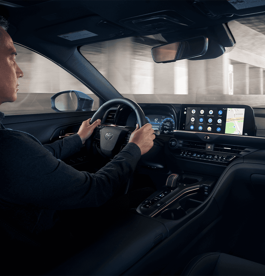 2023 Toyota Crown at Lancaster Toyota in East Petersburg, PA | View of the black interior of a 2023 Toyota Crown while a man is driving