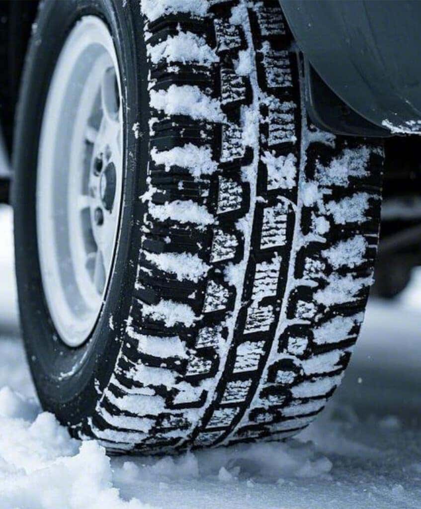 Winter Tires vs. All Season Tires at Lancaster Toyota in East Petersburg, PA | Close up of winter tires on the road