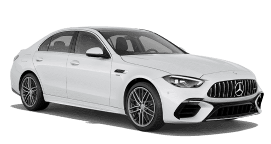 Front three-quarter view of a white Mercedes-Benz C-Class Sedan.
