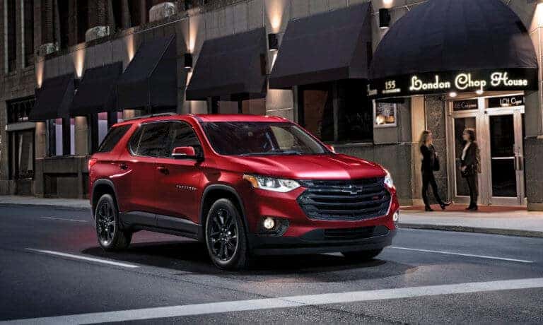 2020 Chevy Traverse driving in the city stoped at red light