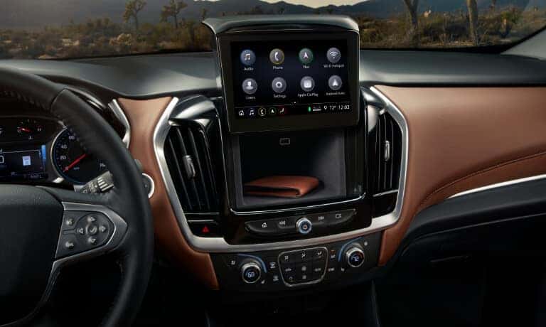 2020 Chevy Traverse youch scteen sliding up to show hidden comparment