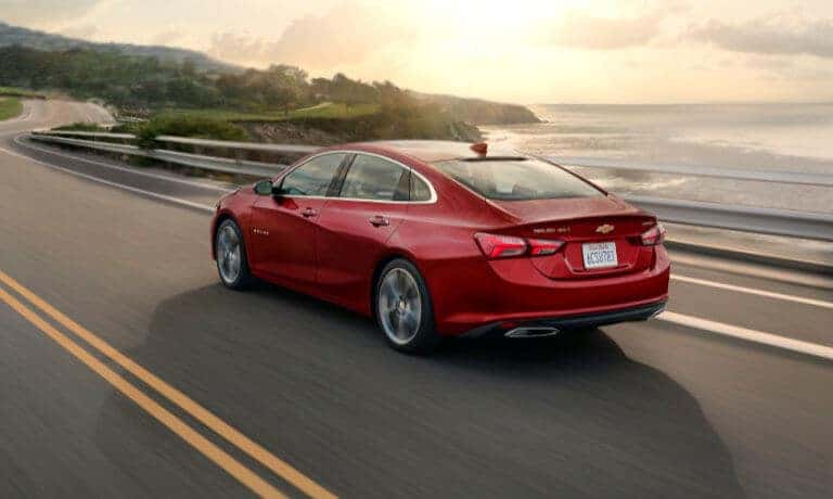 19Chevy-Malibu-ExteriorDrivingWatersideSunset-5x3