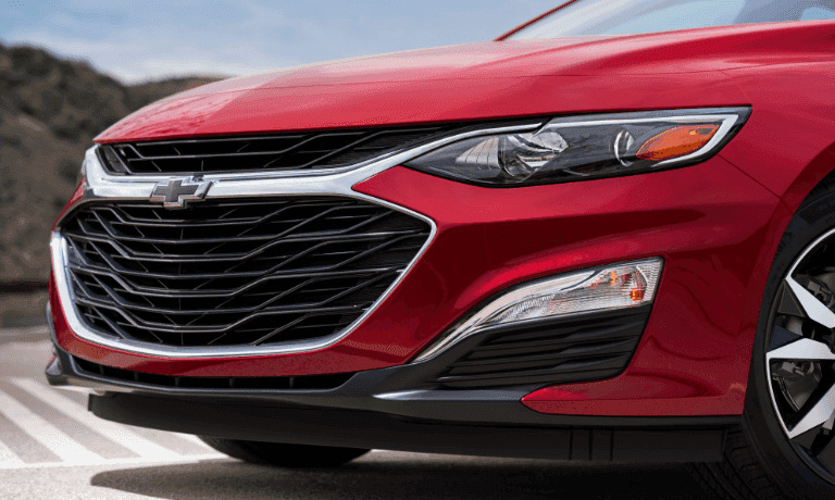 2020 Chevy Malibu in red close up of front grille 