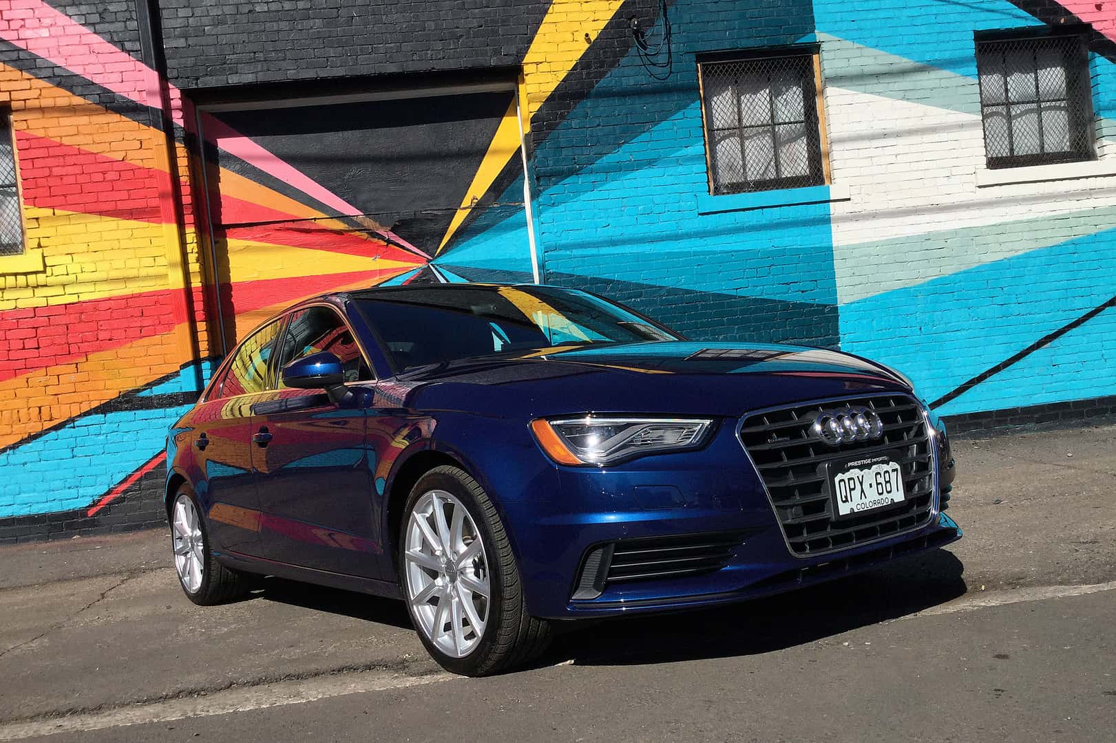 The Audi A3 In Front Of A Colorful Mural Denver S Rino Art District