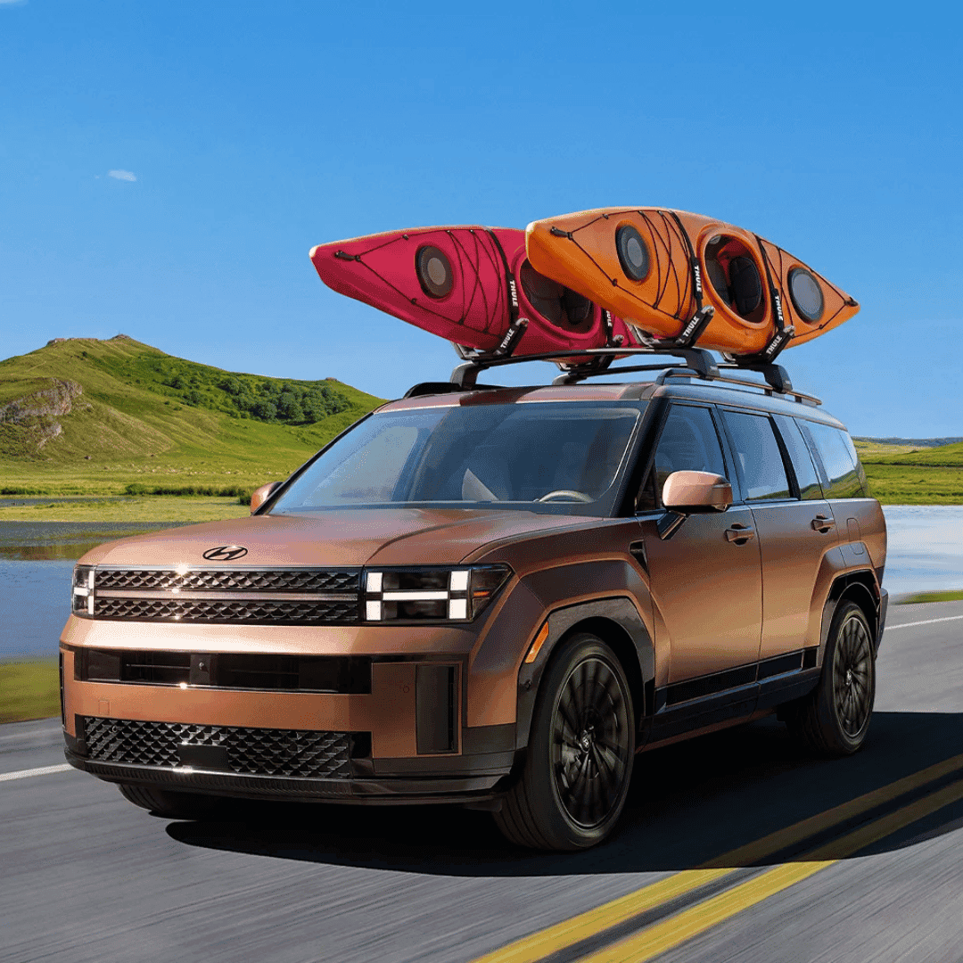 Hyundai Santa Fe Hybrid for Sale near Westfield, Indiana - Santa Fe Hybrid carrying two kayaks on the roof rack