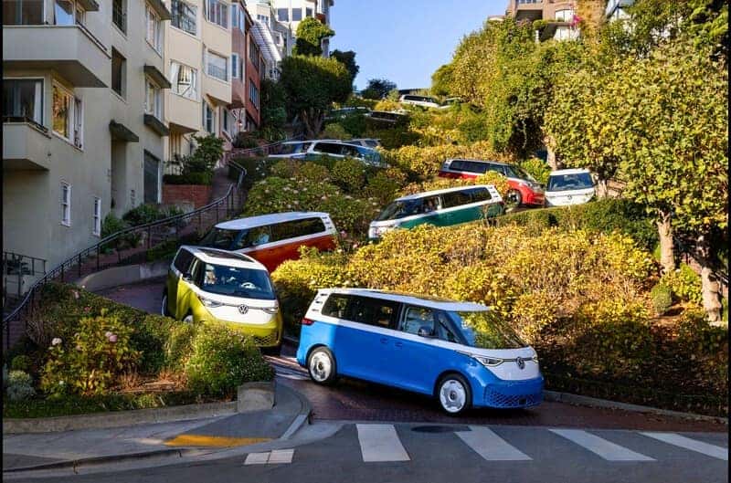 An array of Volkswagen ID.Buzz vans, showcasing the various colour options available. 
