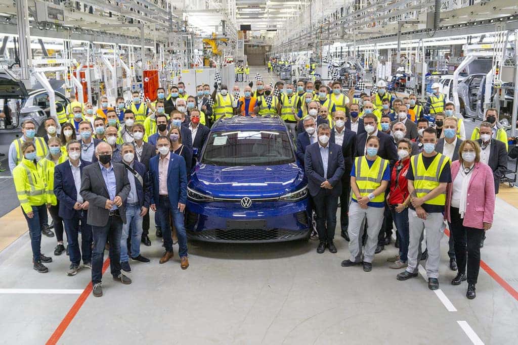 Blue Volkswagen ID4 SUV Factory Hundreds of People