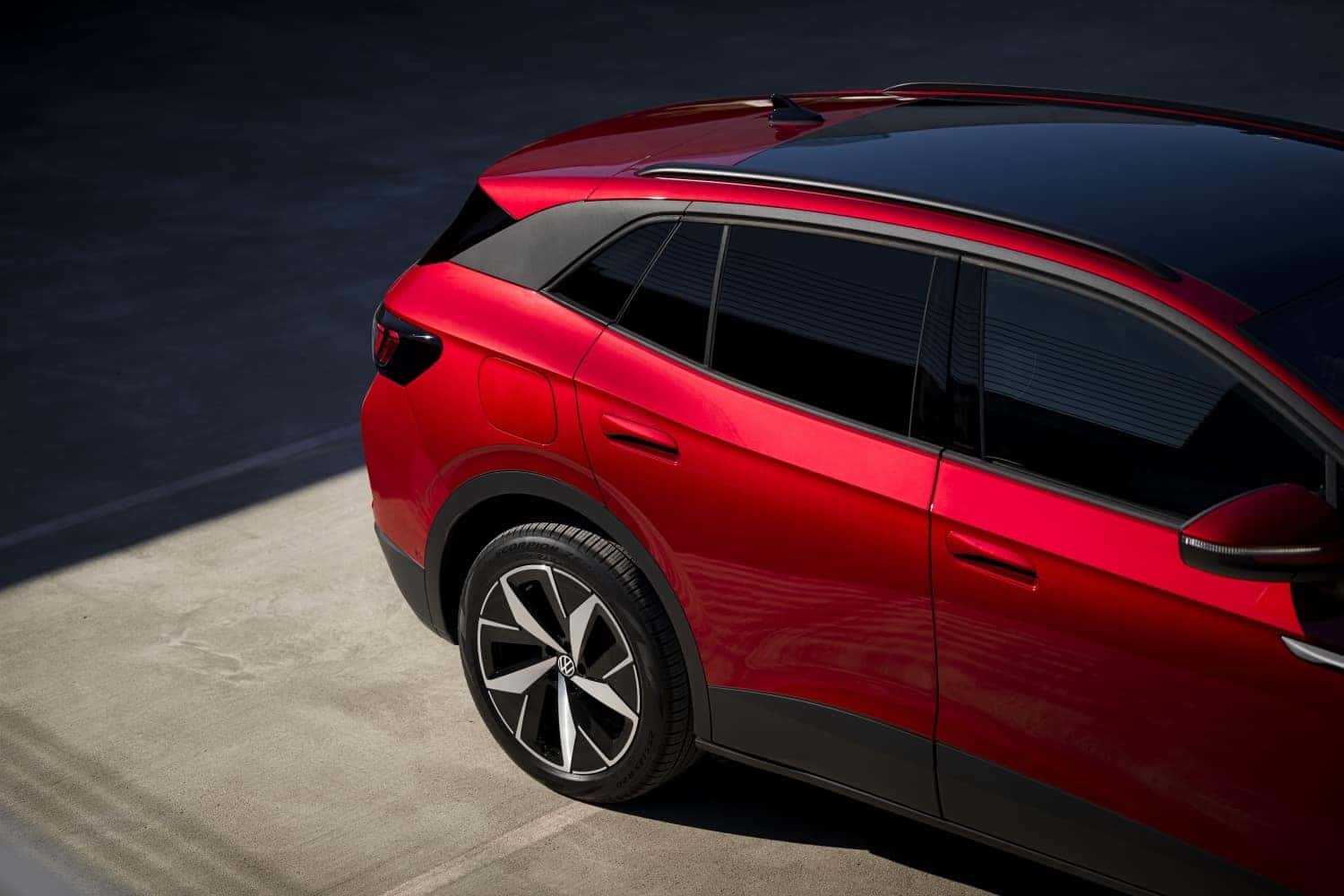Red Volkswagen ID.4 SUV Side Angle