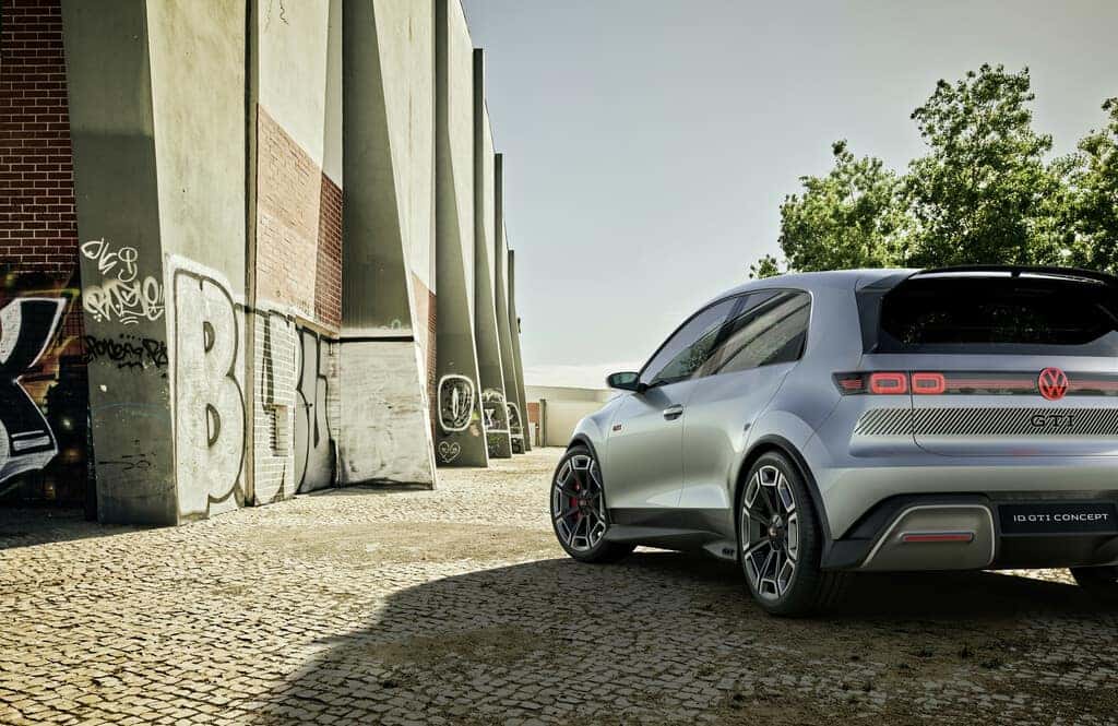 Silver Volkswagen ID.GTI Concept Building Green Trees
