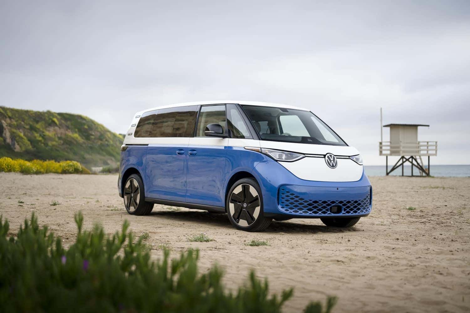 White and Blue Volkswagen ID.Buzz Microbus EV Sand Beach