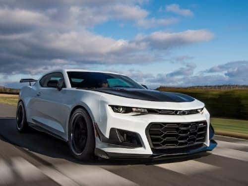 2024 Chevy Camaro driving fast on raceway