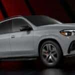 A grey 2026 Mercedes-AMG GLE SUV in studio setting