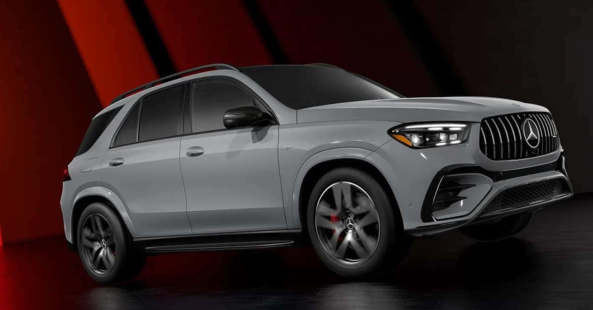 A grey 2026 Mercedes-AMG GLE SUV in studio setting