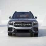 A silver 2026 Mercedes-Benz GLB SUV parked in a minimalist white studio