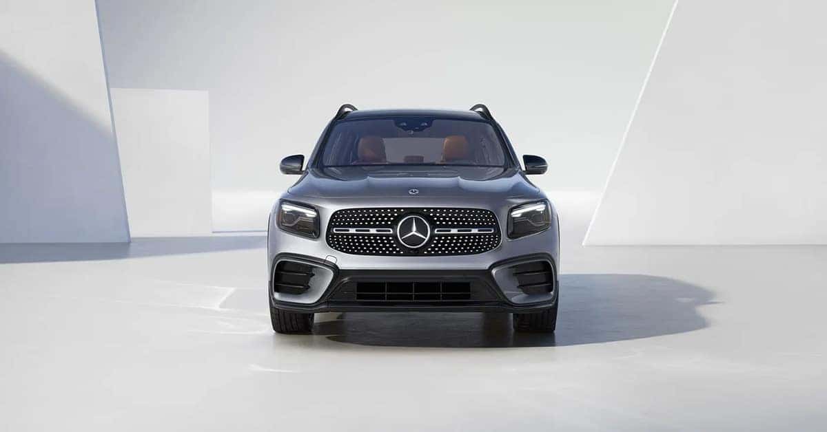 silver 2026 Mercedes-Benz GLB SUV parked in a minimalist white studio environment