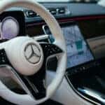 2026 Mercedes-Benz S Class cockpit showing a cream steering wheel
