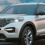 photo of a silver 2022 ford explorer parked on a boardwalk